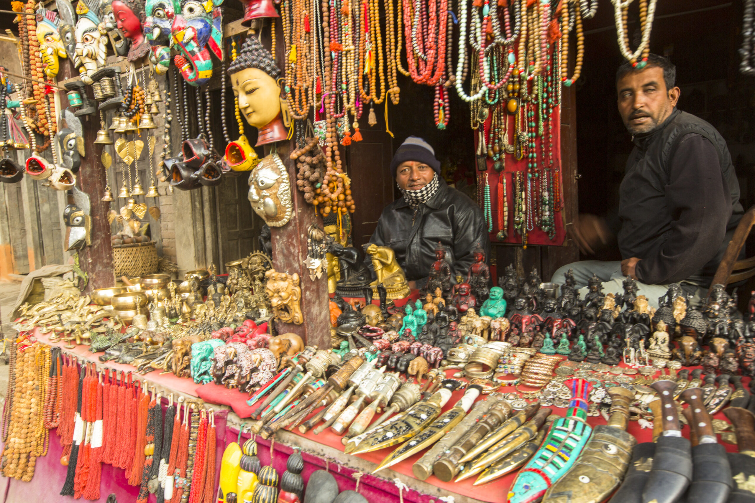 BHAKTAPUR, NEPAL - DEC 07, 2013: Unidentified Nepalese sellers souvenirs. More 100 cultural groups have created an image Bhaktapur as Capital of Nepal Arts.