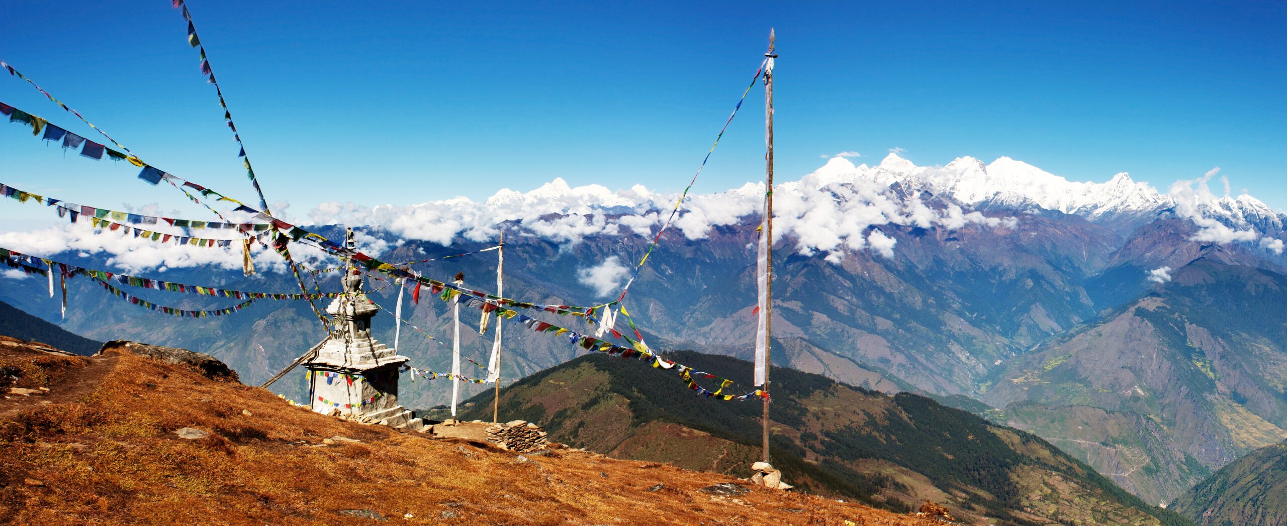 panoramatic view from Langtang to Ganesh Himal, Manaslu and Annapurna with stupa and prayer flags - Nepal