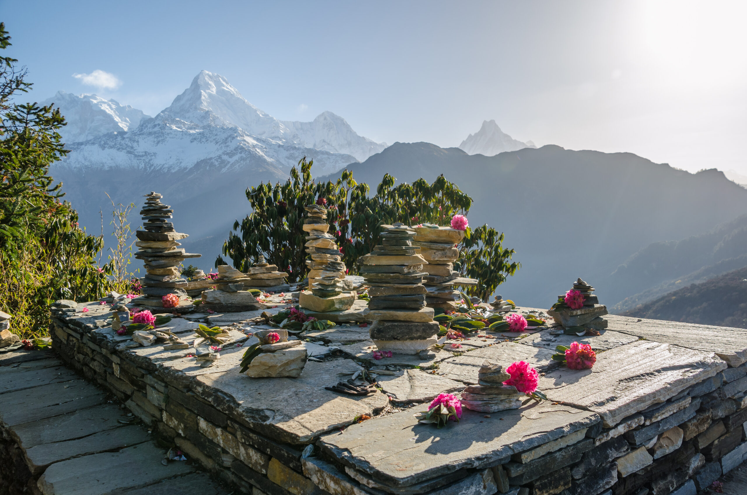 Annapurna mountain range with rock altar, a massif in the Himalayas in north-central Nepal , Annapurna conservation area , Nepal.