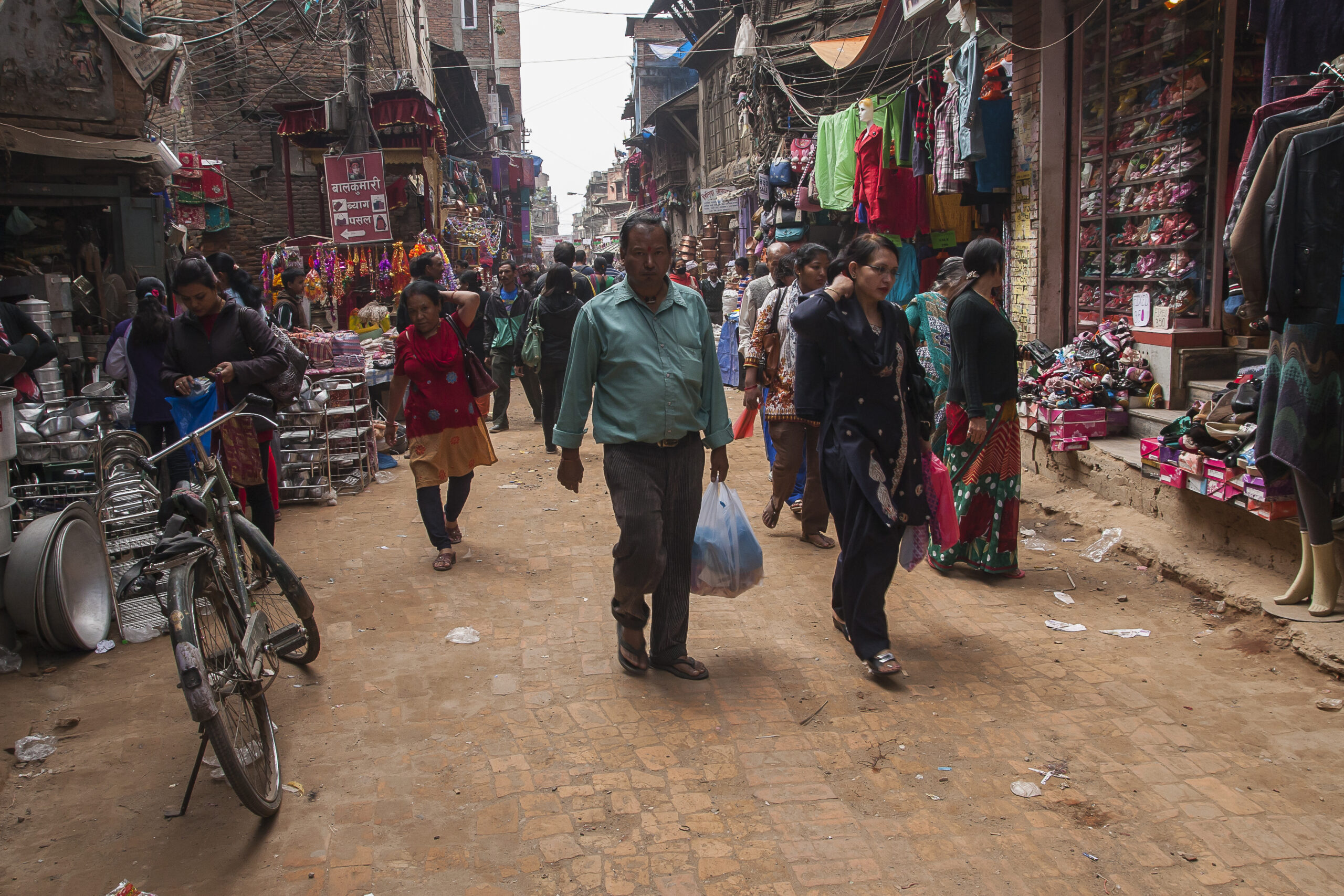 Kathmandu, Nepal - October 31, 2013: Nepalese in the ethnographic sense did not exist in the past as a tribe. The ethnogenesis of modern Nepalese biggest role played three groups of people: Newar people, Khasa and Gurkhas. The name "Nepal" and "Nepalese" comes from the dominant culture Newars ethnic group, living in the Kathmandu Valley for centuries, speakers of the language Himalayan newari. Nepalese live actually in the natural economy. About 75% of the natural flow of income from agriculture (17% of the land is arable land).