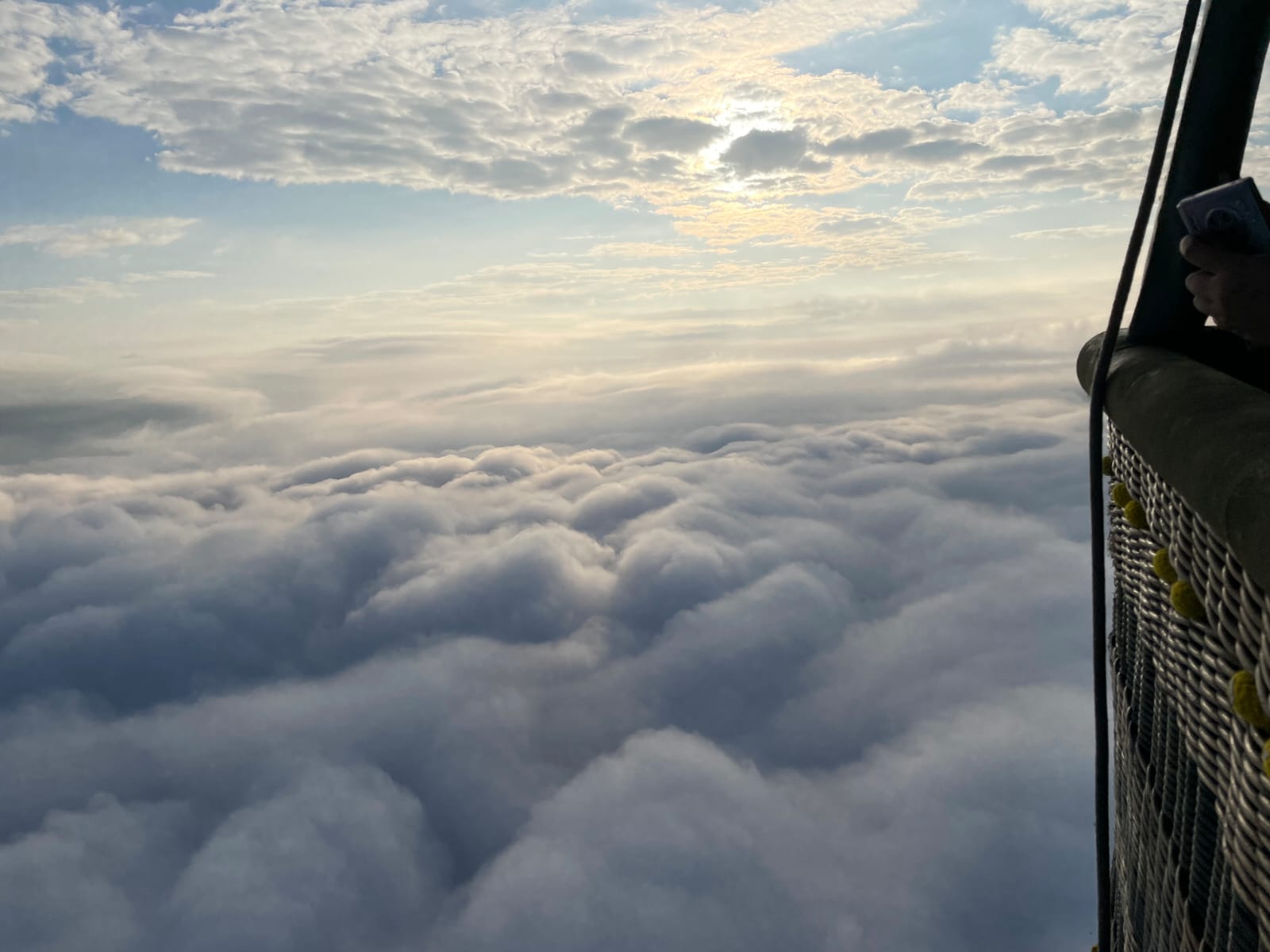 Flying on hot air balloon alongside the towering Annapurna Range and above the clouds in Pokhara